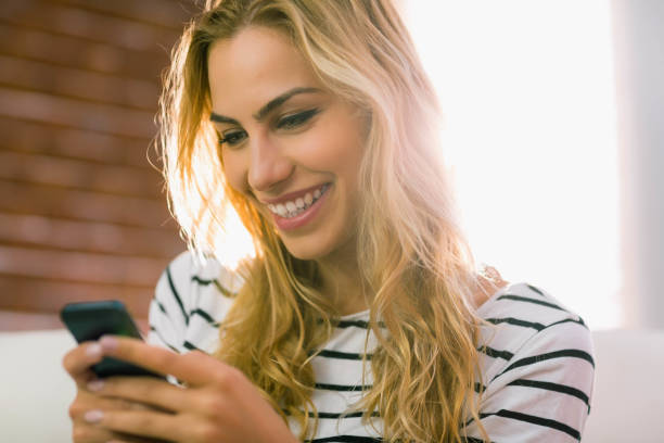 istock Pretty blonde on the phone 665287802