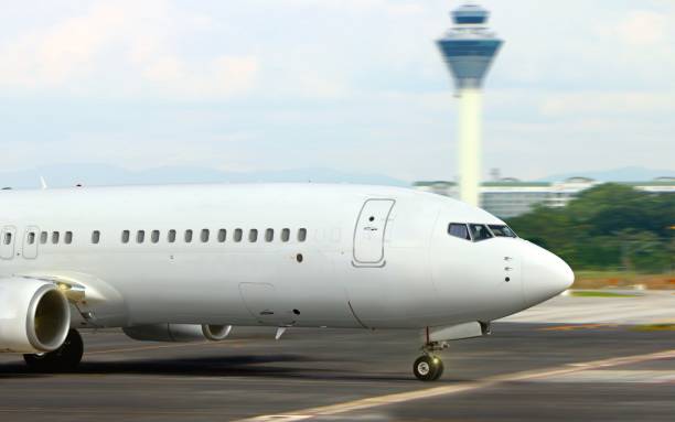istock Airplane on runway taking off from airport 665294142