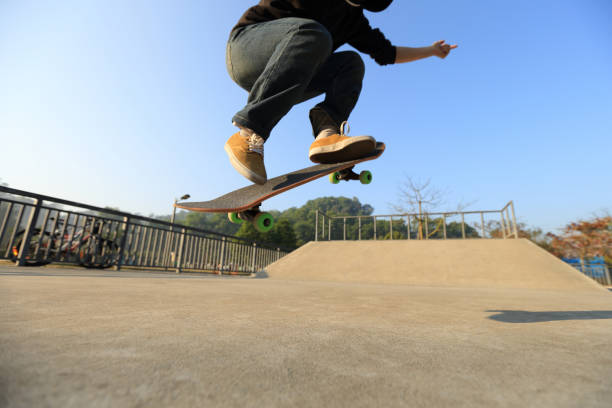 istock young skateboarder legs skateboarding at skatepark 665298332