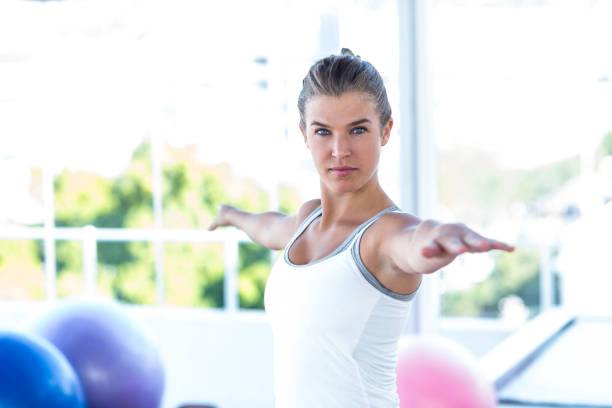 istock Serious woman with arms outstretched 665301322