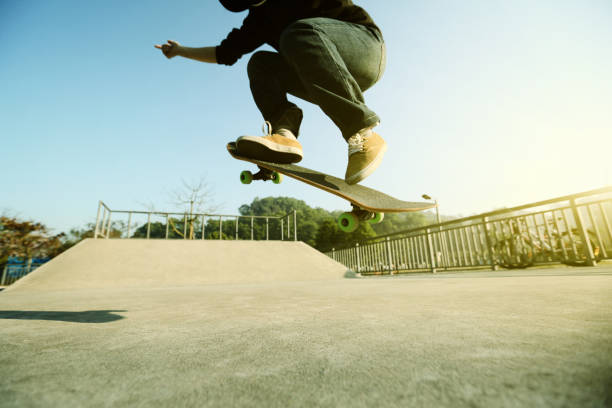 istock young skateboarder legs skateboarding at skatepark 665308004