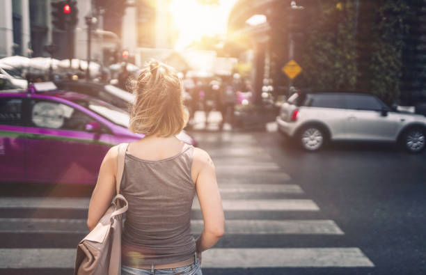 Young woman exploring streets of Bangkok Young woman exploring streets of Bangkok. Thailand bangkok street stock pictures, royalty-free photos & images