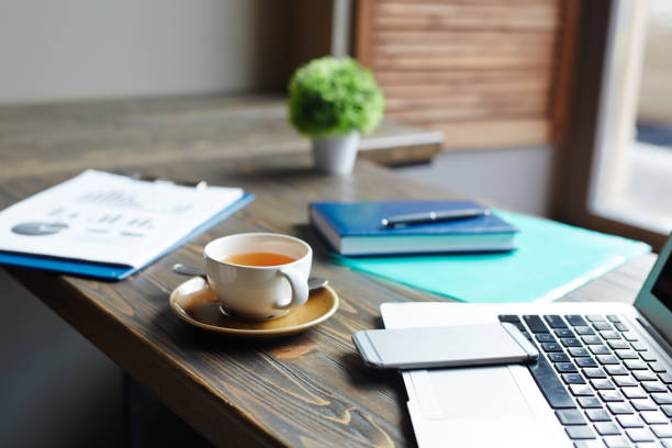 istock Closeup Shot of Business objects on Table in Cafe 665315896