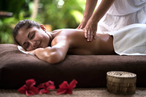 istock Woman enjoying in a massage at the spa. 665318266