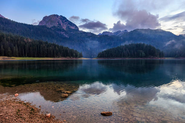 istock Evening over lake and mountain 665319456