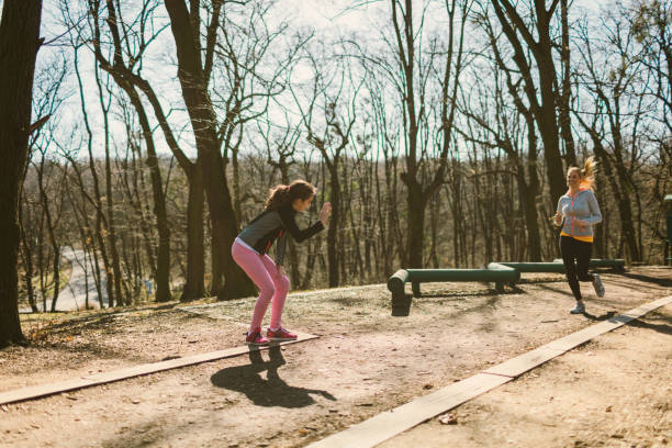 istock Mother and daughter on training outdoors 665323822