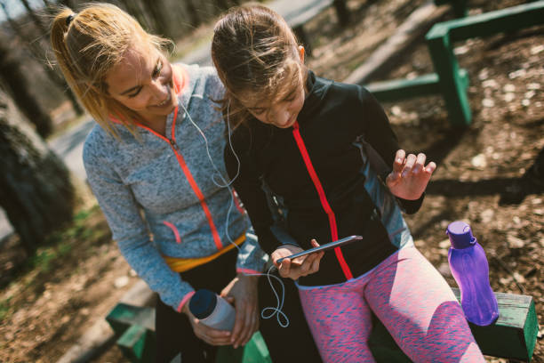 istock Mother and daughter on training outdoors 665326398