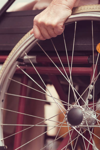 istock Disabled elderly lady using wheelchair at home 665333986