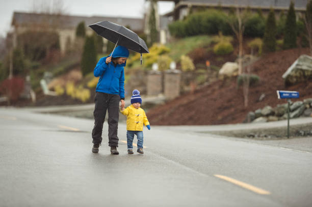istock Family Walk in the Rain 665334230