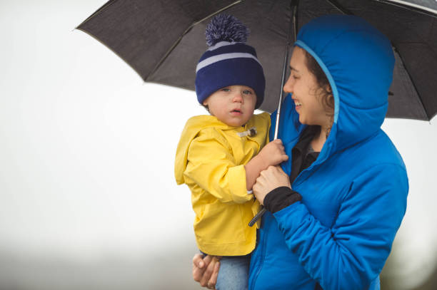 istock Family Walk in the Rain 665334240