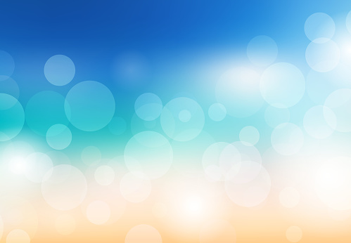 Blurred summer background. Beach with sparkles and bokeh. Vector background for your creativity