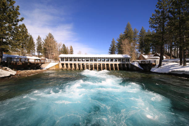 Lake Tahoe Dam Earlier this spring, Lake Tahoe had to open two valves to release the pressure building in Lake Tahoe from the enormous amounts of melting snow.  truckee river photos stock pictures, royalty-free photos & images