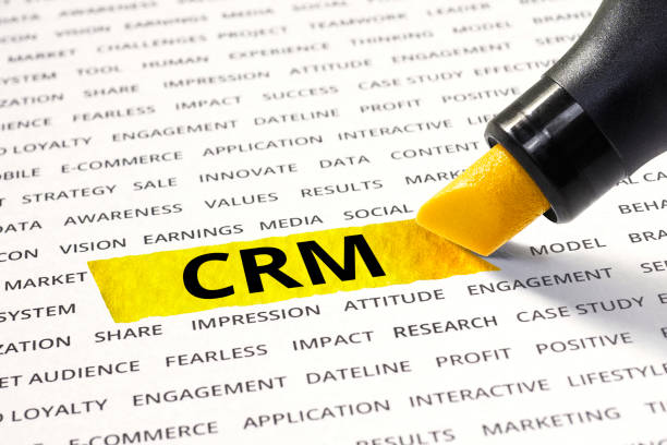 istock Word CRM highlighted with marker on other related words. 665344762