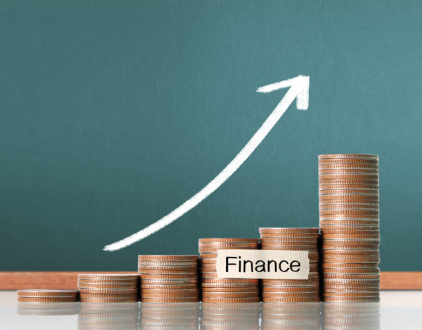 istock Coins graph stock market 665345552