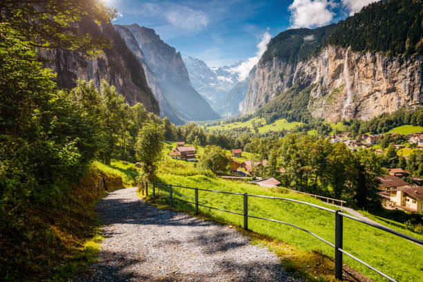 istock Great view of alpine village glowing by sunlight. 665345824