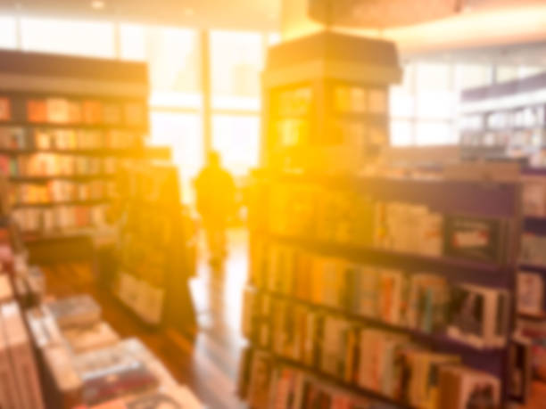 Blur image of a bookstore . with sun light