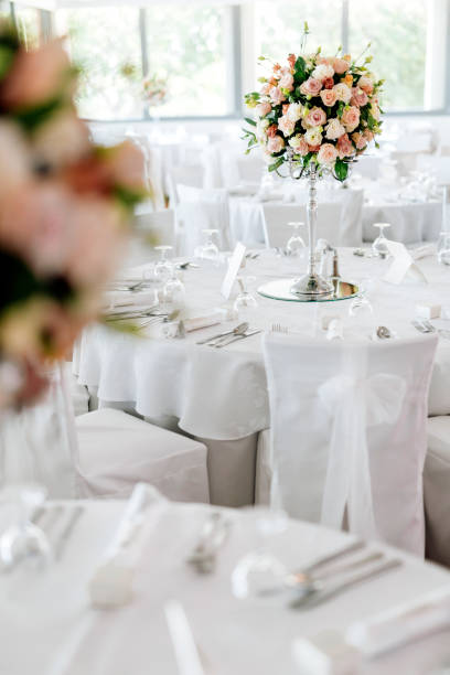 istock Beautiful wedding tables and roses in bouquet 665353394