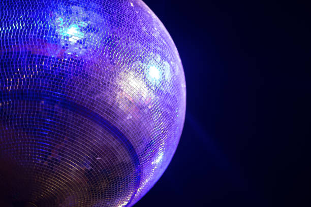 istock Blue lit disco ball party concept 665356642
