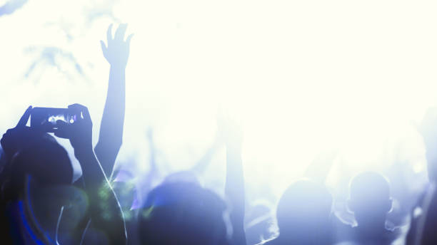 istock People celebrating and dancing in festival 665356818