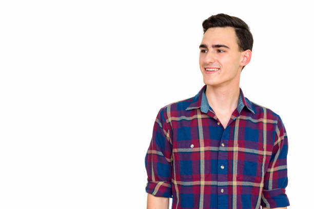istock Studio shot of young happy businessman smiling while thinking isolated against white background 665356972