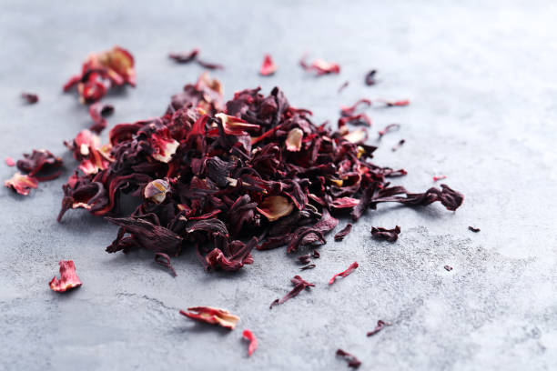 istock Heap of dry tea on grey table 665364146
