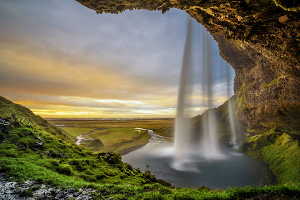 istock Sunset over the famous Seljalandsfoss Waterfall  in Iceland 665364156