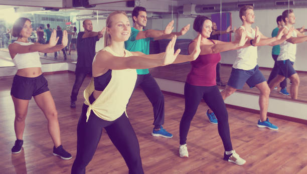 istock Adults having group fitness class 665364250