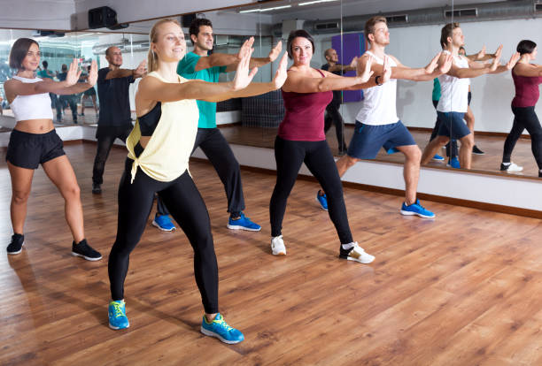 istock Adults having group fitness class 665364252