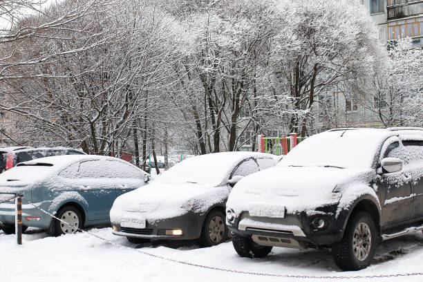istock car in a winter morning with snow covered 665364610