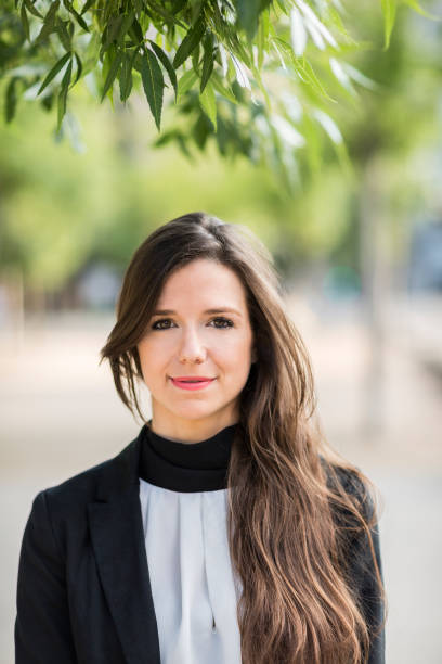 istock Smiling woman wearing formal clothes 665366136
