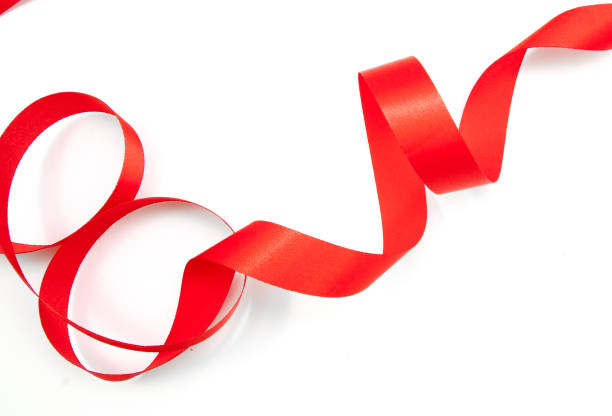 istock red ribbon serpentine isolated on white background 665366626