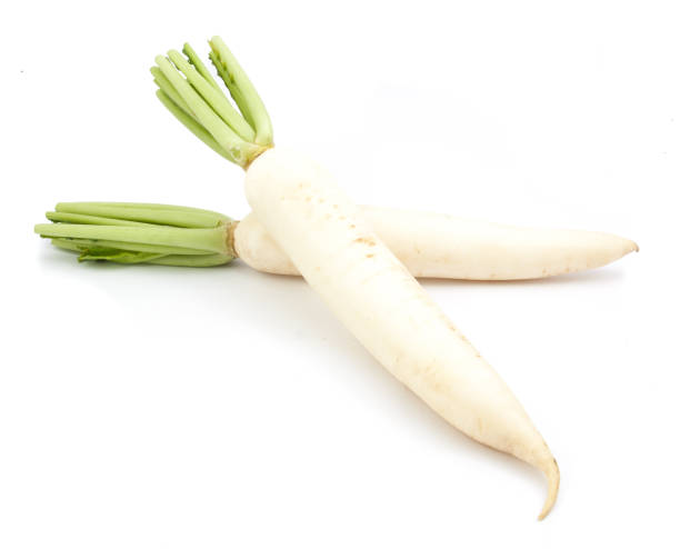 istock daikon radishes isolated on white background 665366998