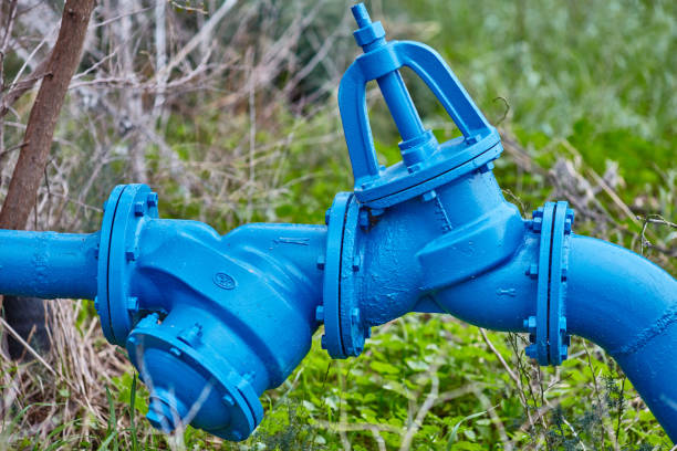 istock big metal pipe with nature background 665372284