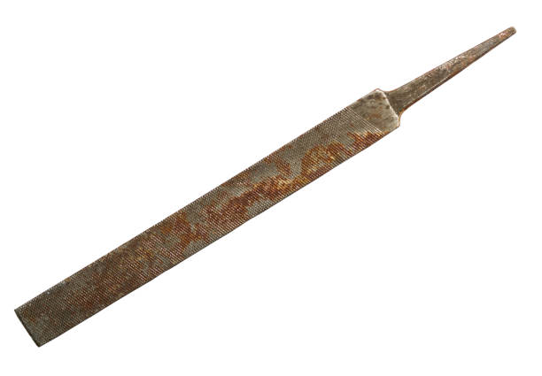 istock Old rusty flat file for metal isolated on white background 665375298