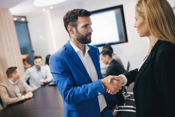 istock Business people shaking hands  in modern conference office 665375630