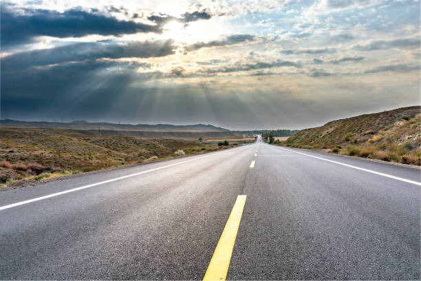 istock An empty straight   highway ,Xinjiang province,China. 665376212