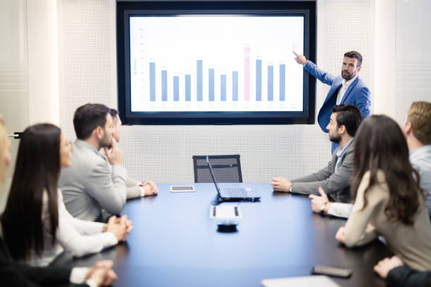 istock Business people analyzing data at meeting in office and doing statistics 665377218