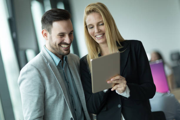 istock Business colleagues at information technology company offices 665379882