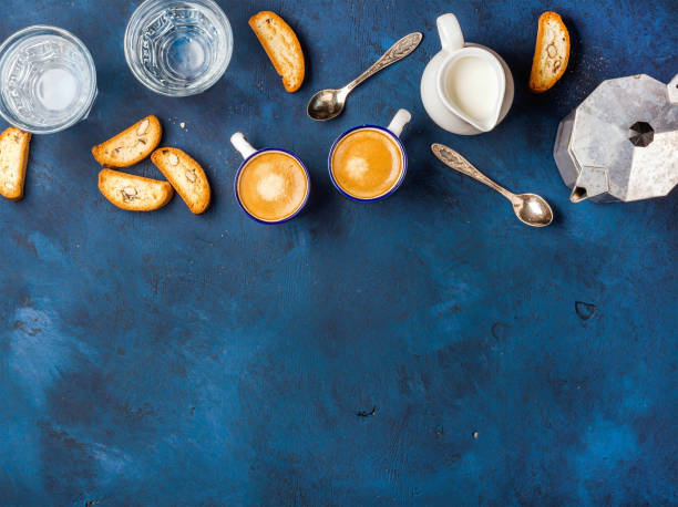 coffee espresso, cookies and milk over dark blue background, vertical - milk milk bottle drinking straw cookie imagens e fotografias de stock