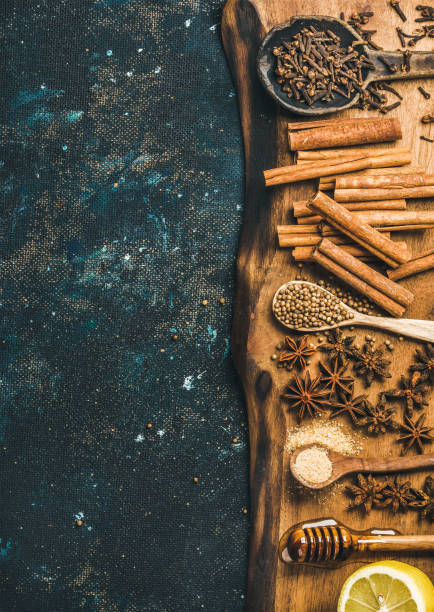 istock Ingredients for making gluhwein on wooden rustic board, copy space 665386946