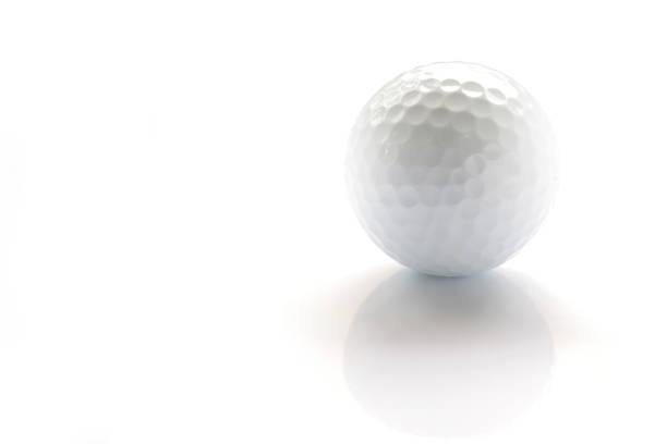 istock white golf ball on shiny mood 665389950