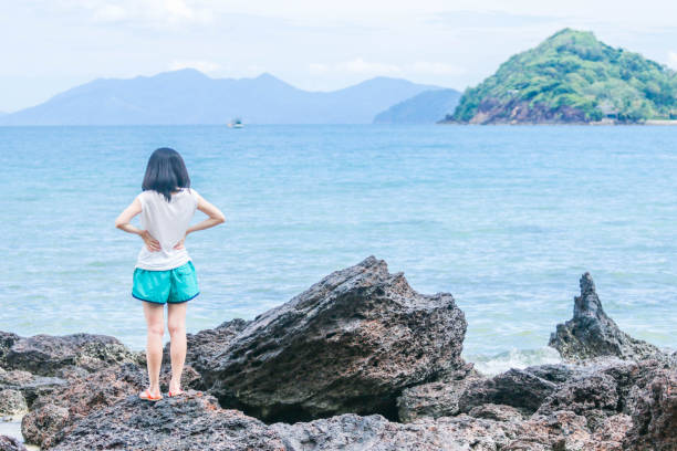 istock Young woman relax on the beach 665390196