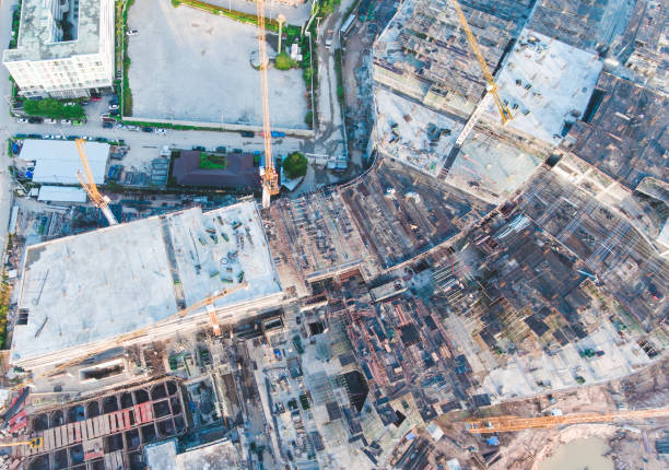 istock Aerial view of construction site and large crane 665393712