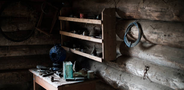 istock The old, abandoned, obsolete barn with some old stuff in a small village in Belarus, Eastern Europe 665394700
