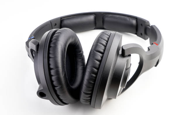 istock Black leather headphone isolated on white 665404950