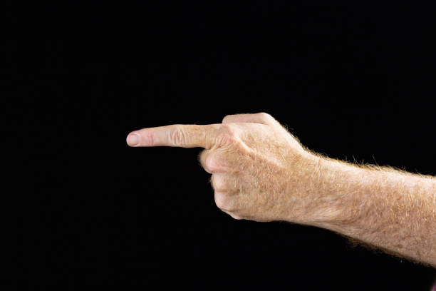 istock Hand signs: left hand pointing to the left on black 665406614