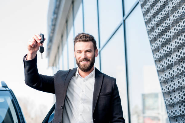 istock Man with keys near the car 665410080