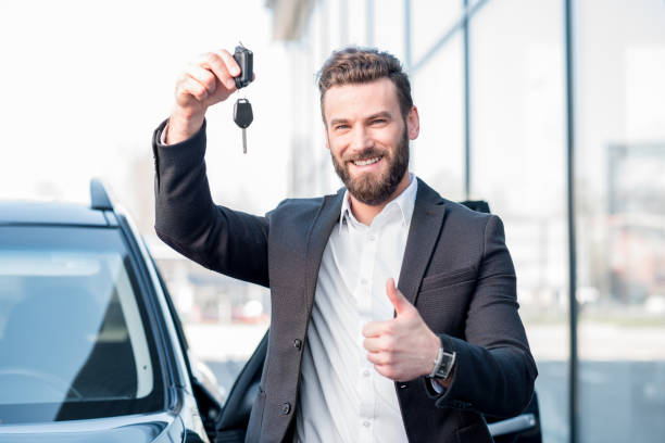 istock Man with keys near the car 665410138