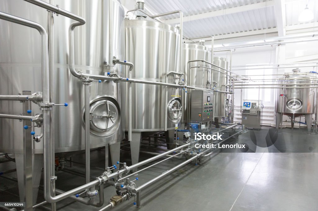 Technological equipment in modern  dairy plant Industry Stock Photo