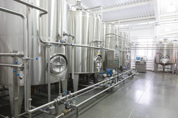 Technological equipment in modern dairy plant Technological equipment in modern dairy plant fermenting photos stock pictures, royalty-free photos & images